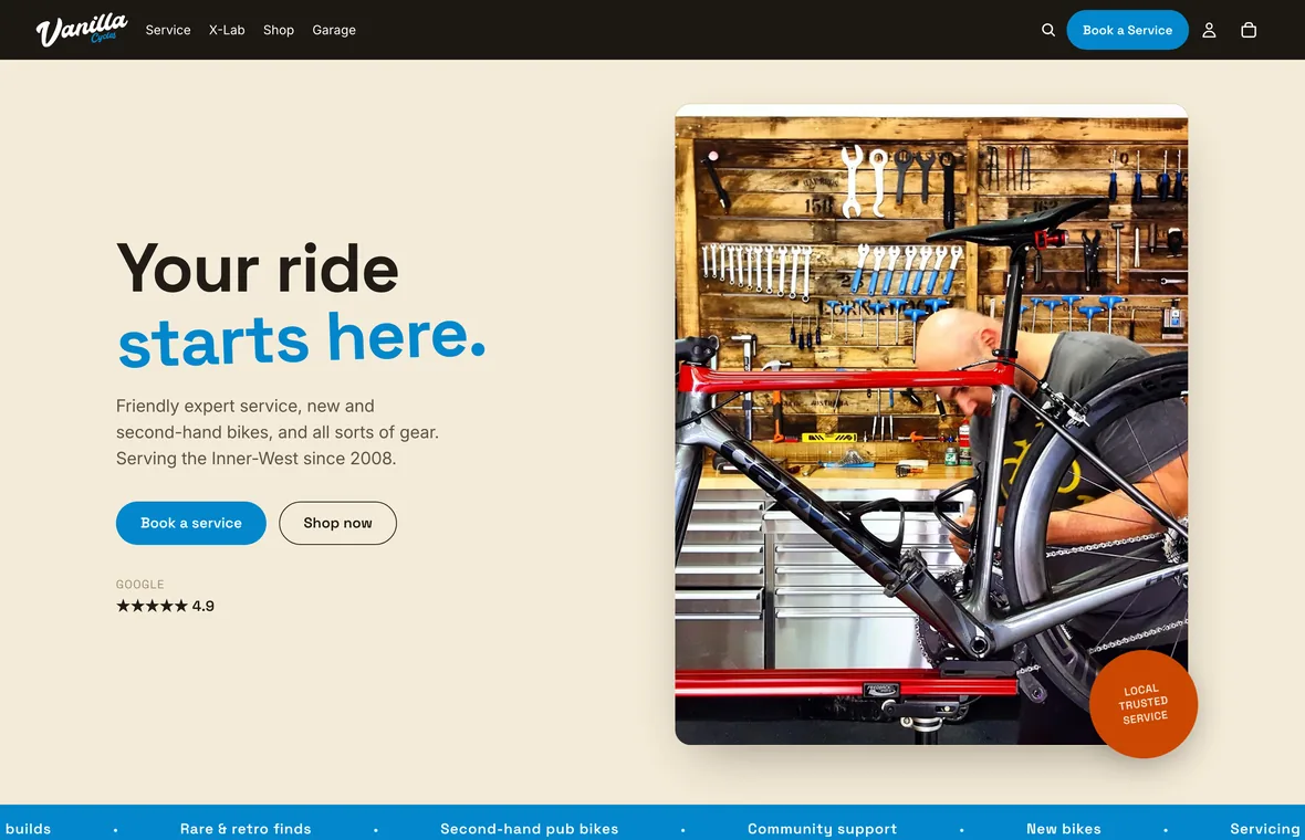 Vanilla Cycles home page with the headline “Your ride starts here.”, buttons to book a service or shop, and a photo of a mechanic working on a road bike.